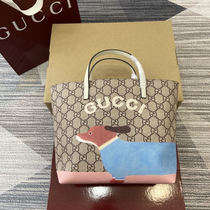 G*u*i shopping bags